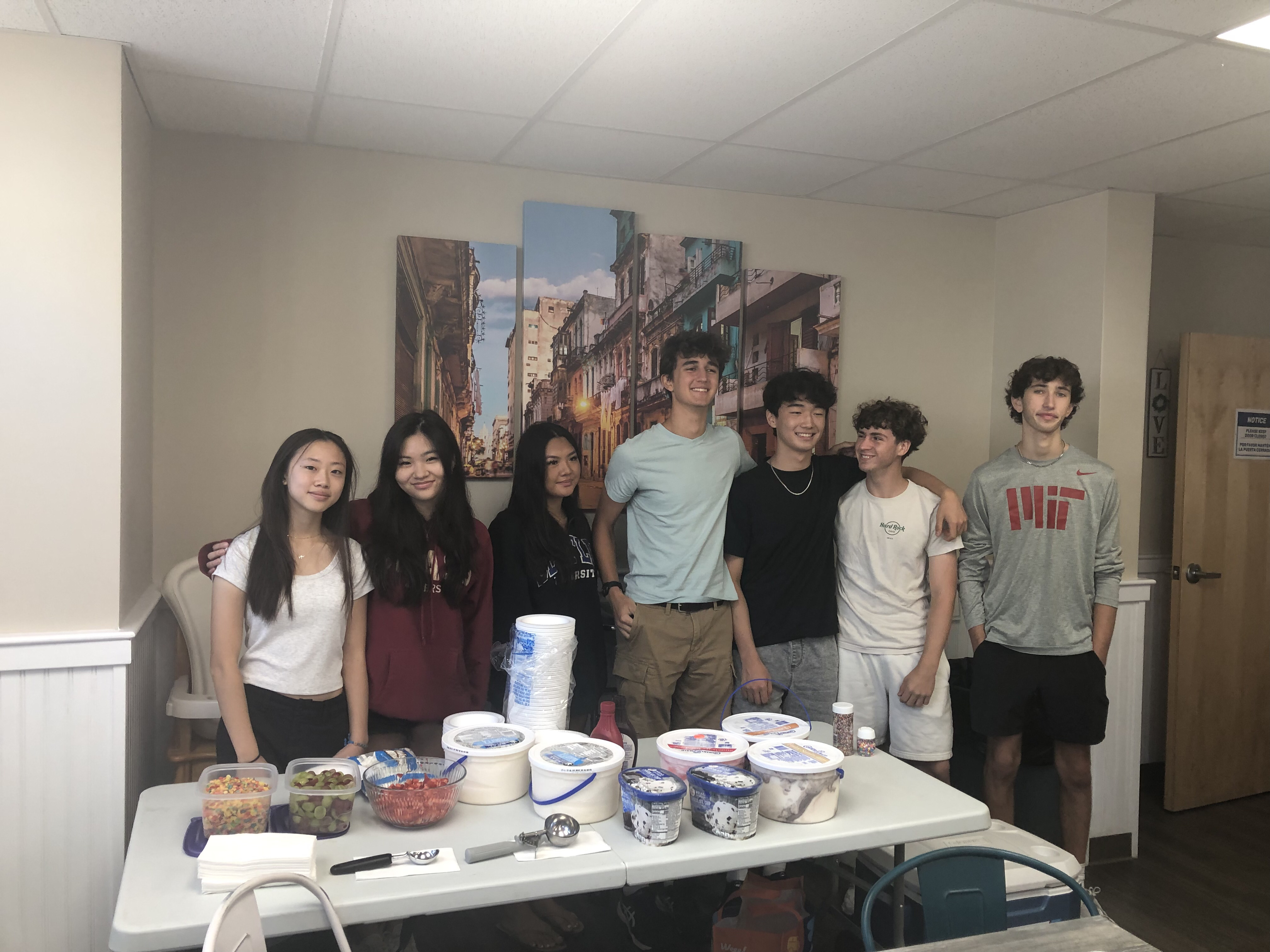 Volunteers preparing or delivering community meals